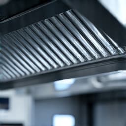 Commercial kitchen hood with exhaust fan