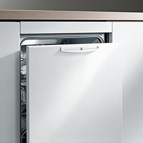 Miele integrated dishwasher service Sacramento, technician performs final alignment checks for seamless integration.