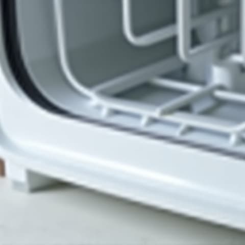 After image of a residential dishwasher with a new, perfectly installed seal, demonstrating no leakage and a clean surrounding area in a Sacramento home. The repair ensures long-term protection against water damage.